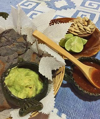 Abigail Botanas con Mezcal MC