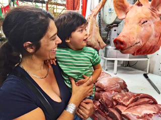 Mom and Baby with Pig Head Mom and Baby with Pig Head